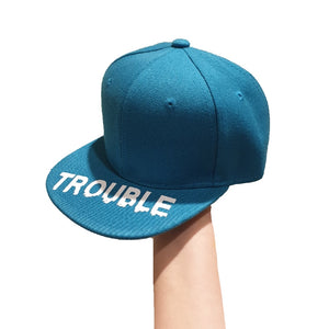 Trouble turquoise snapback cap
