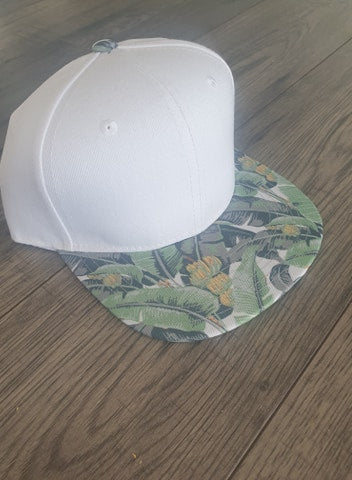 White (personalised) snapback cap with leaf design peak